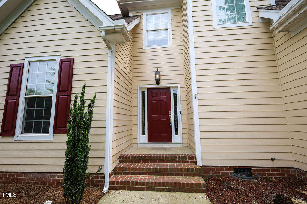 10 London Way Spring Lake, NC 28390 - Photo 3 of 26 a view of a house with a door and wooden floor
