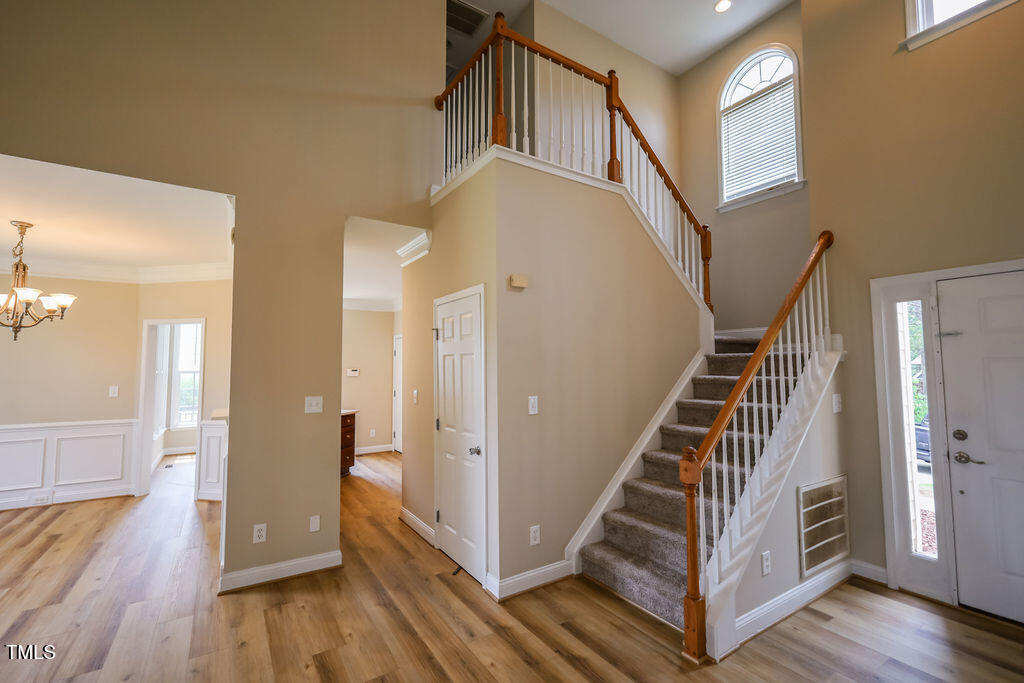 10 London Way Spring Lake, NC 28390 - Photo 5 of 26 a view of entryway and hall with wooden floor