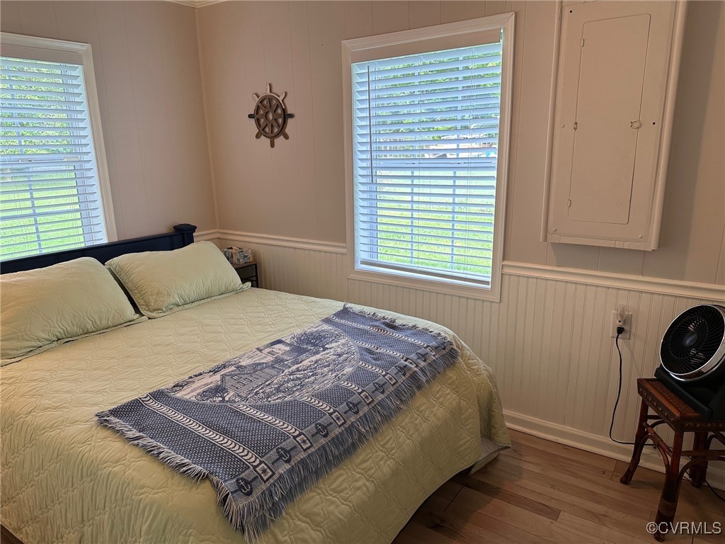 328 Cow Shed Road Lancaster, VA 22503 - Photo 18 of 27 a bedroom with a bed and a window