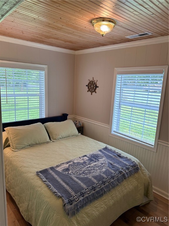 328 Cow Shed Road Lancaster, VA 22503 - Photo 20 of 27 a bedroom with a bed and a window