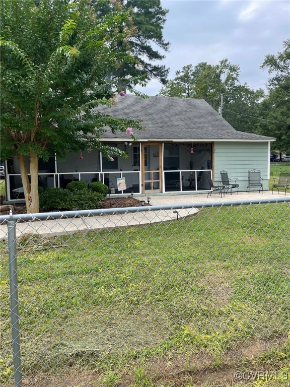 328 Cow Shed Road Lancaster, VA 22503 - Photo 3 of 27 a house with trees in the background
