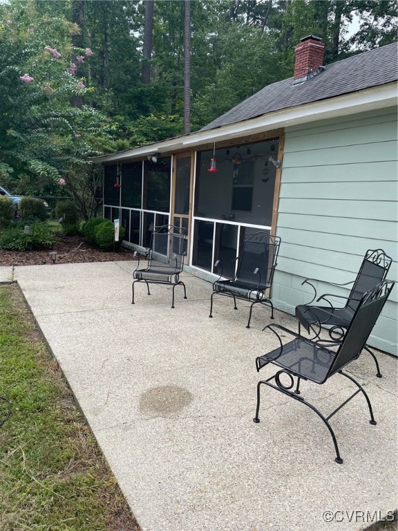 328 Cow Shed Road Lancaster, VA 22503 - Photo 5 of 27 a view of a lounge chairs in the patio