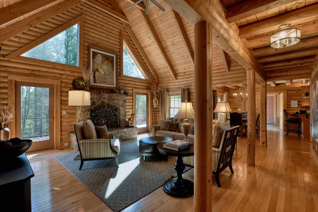 a view of balcony with furniture and wooden floor