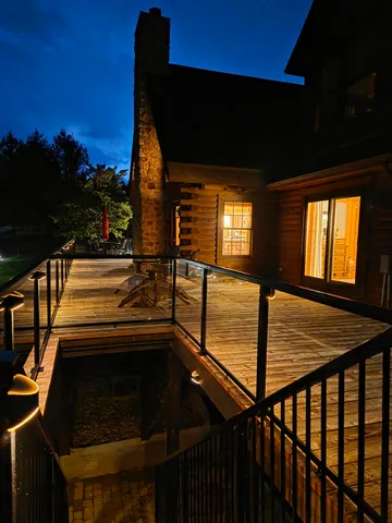 a kitchen with granite countertop stainless steel appliances a stove a microwave and cabinets