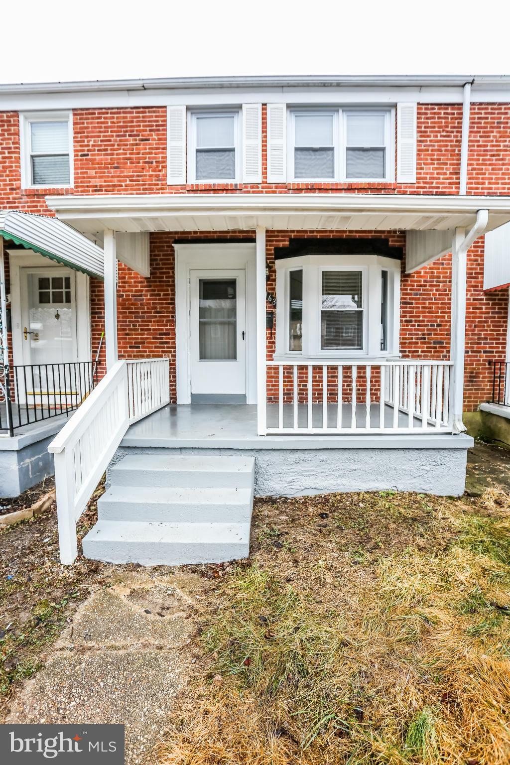 8163 Kavanagh Road Dundalk, MD 21222 - Photo 3 of 21 a front view of a house with a porch
