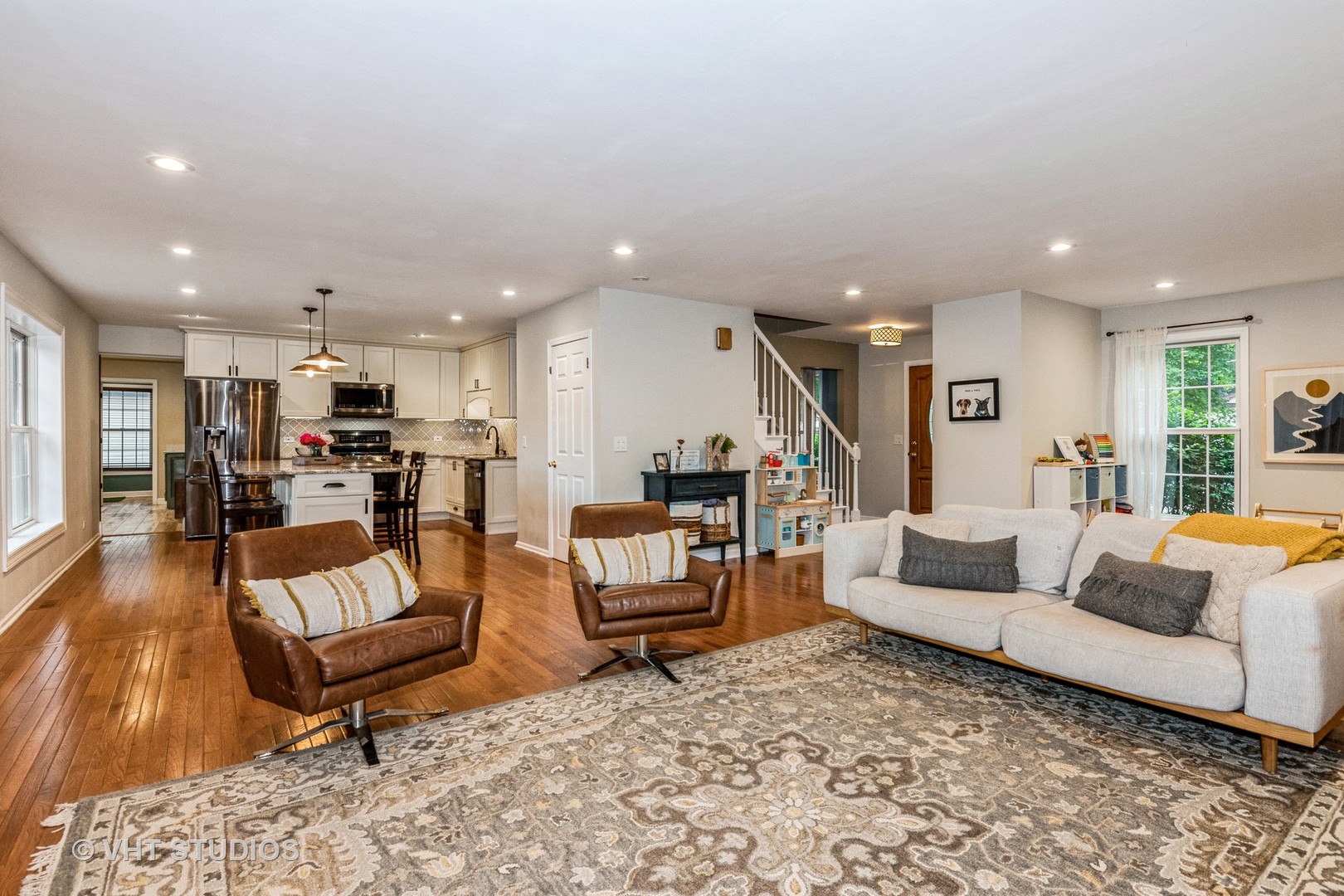 1057 Ponca Drive Batavia, IL 60510 - Photo 4 of 23 a living room with furniture and a wooden floor