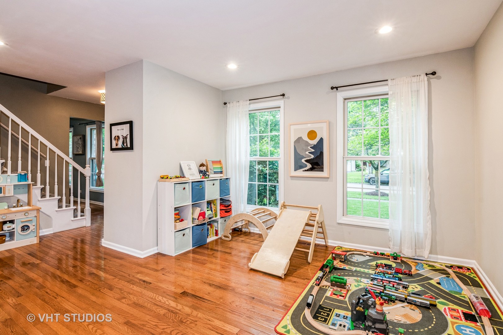 1057 Ponca Drive Batavia, IL 60510 - Photo 5 of 23 a bedroom with furniture and a book shelf