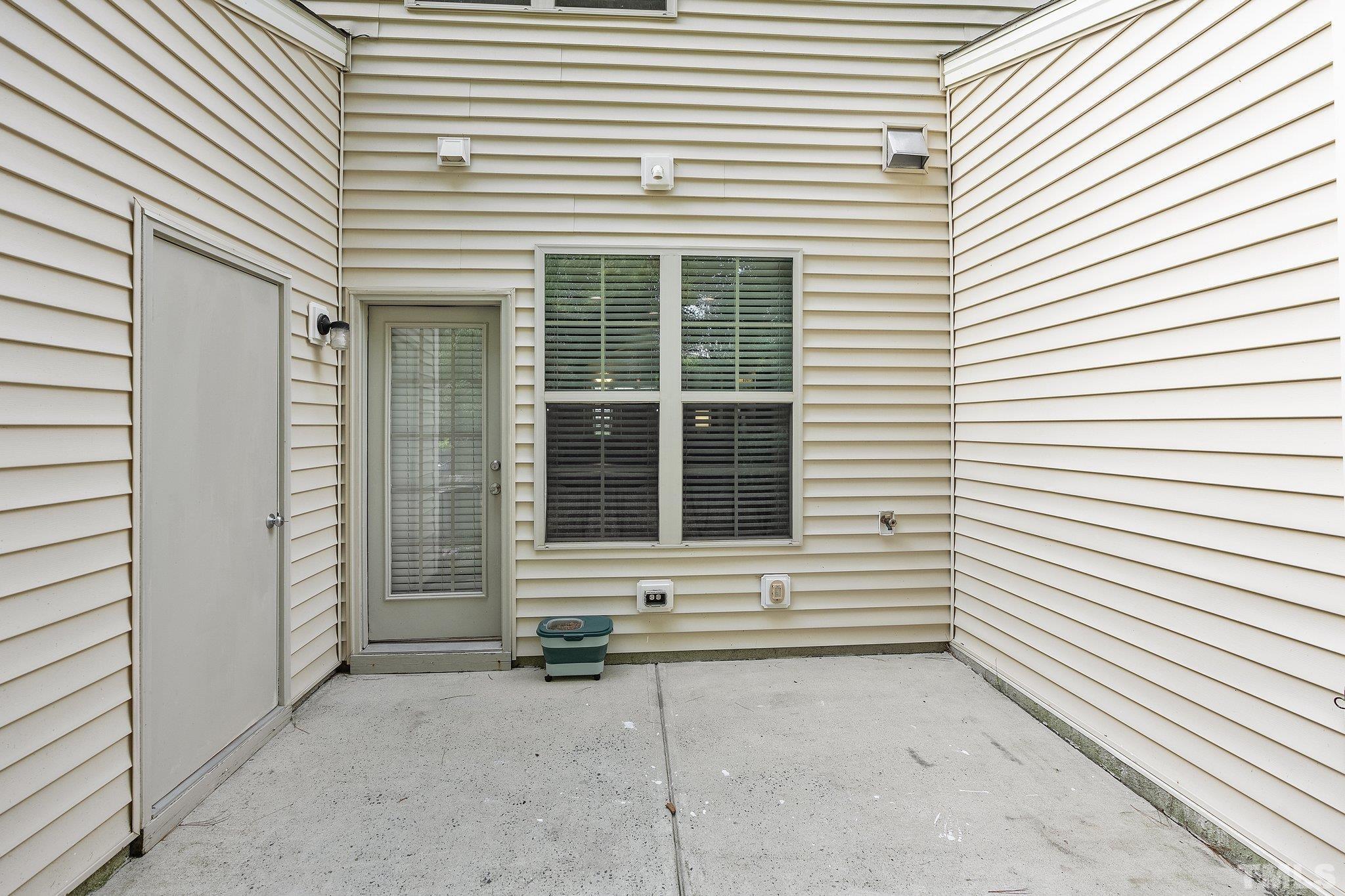8564 Quarton Drive Raleigh, NC 27616 - Photo 25 of 28 a view of a house with white door