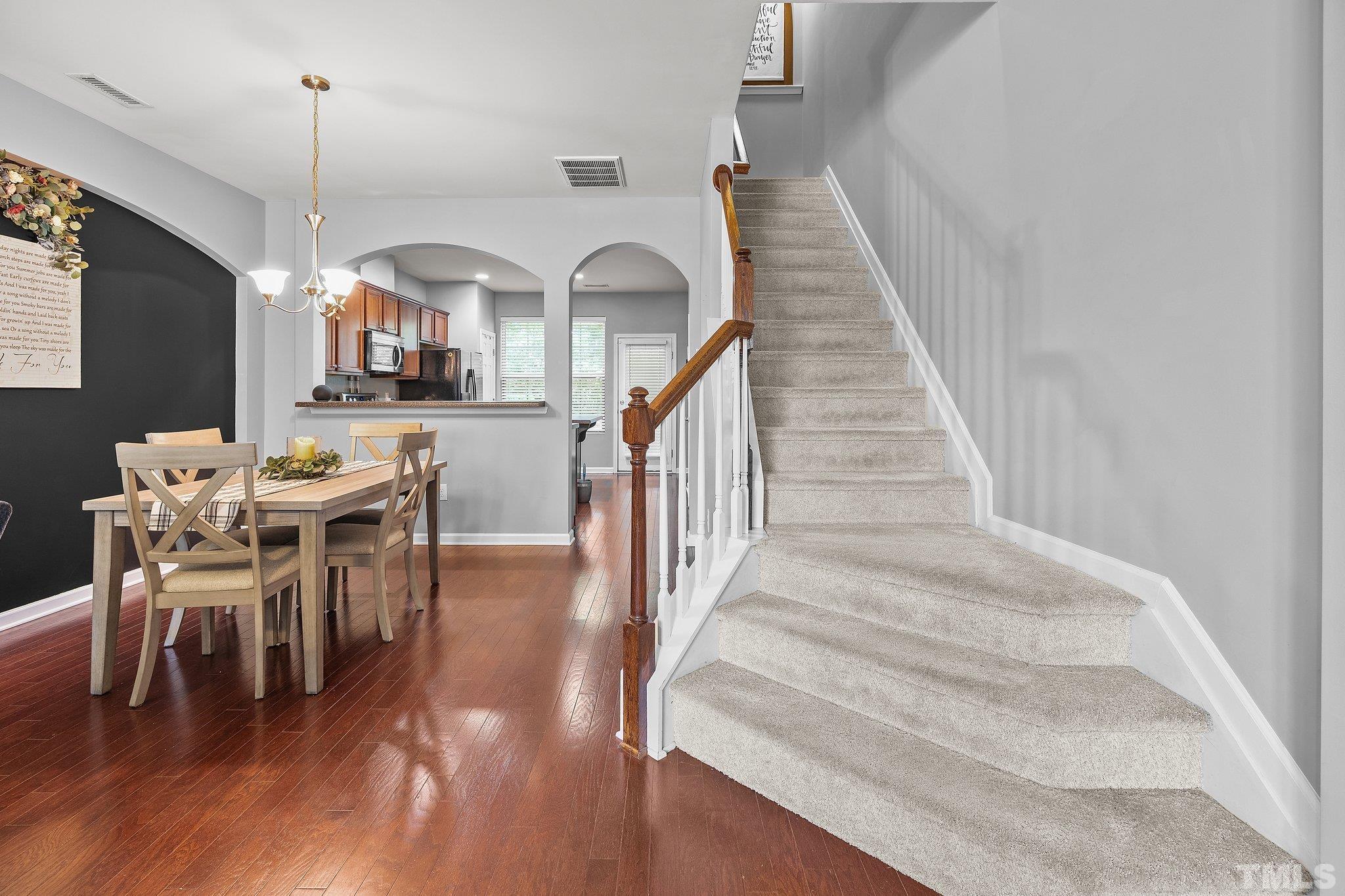 8564 Quarton Drive Raleigh, NC 27616 - Photo 8 of 28 a view of entryway and dining room