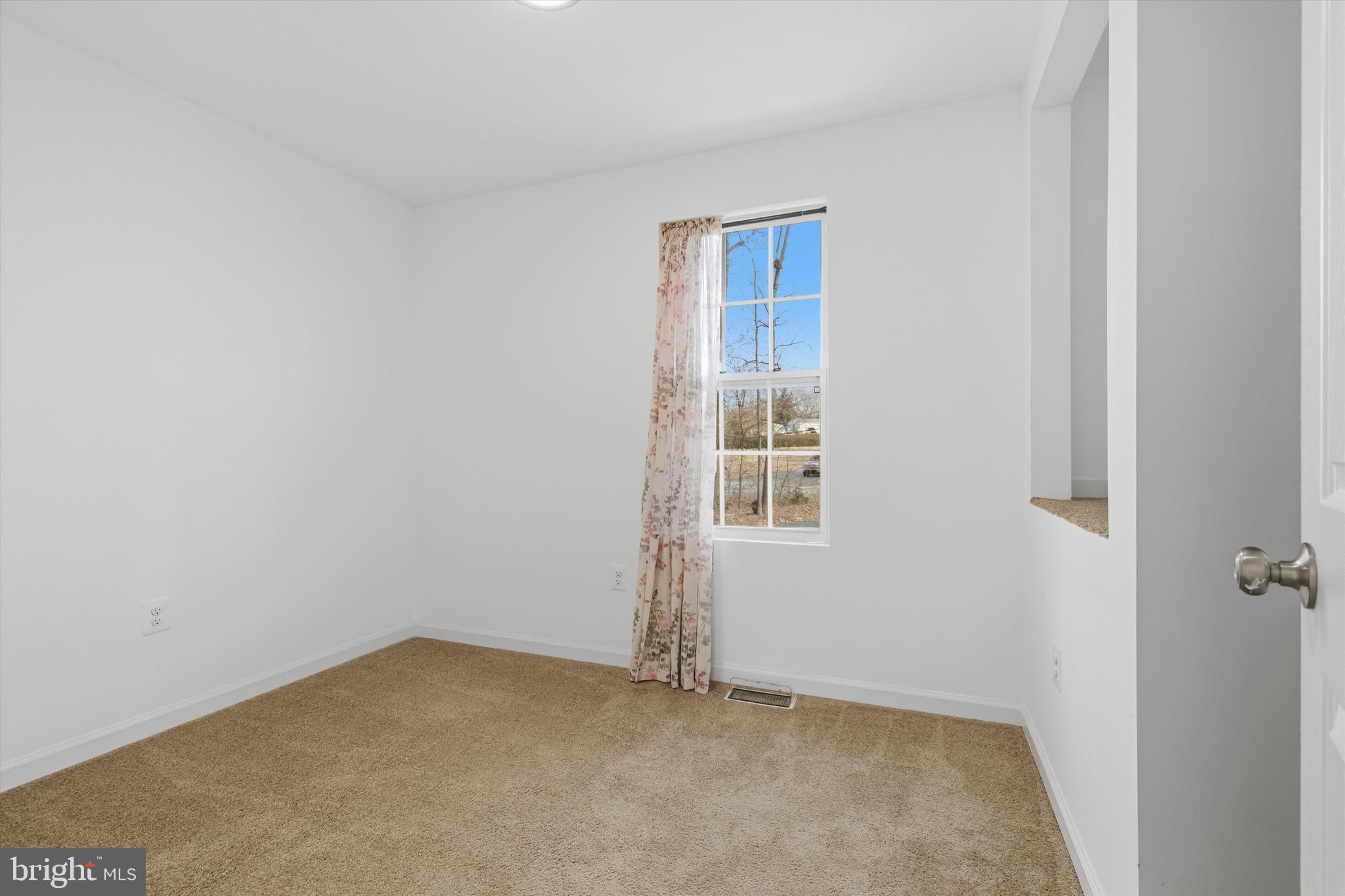 7428 Hawkins Drive Hanover, MD 21076 - Photo 27 of 44 an empty room with windows