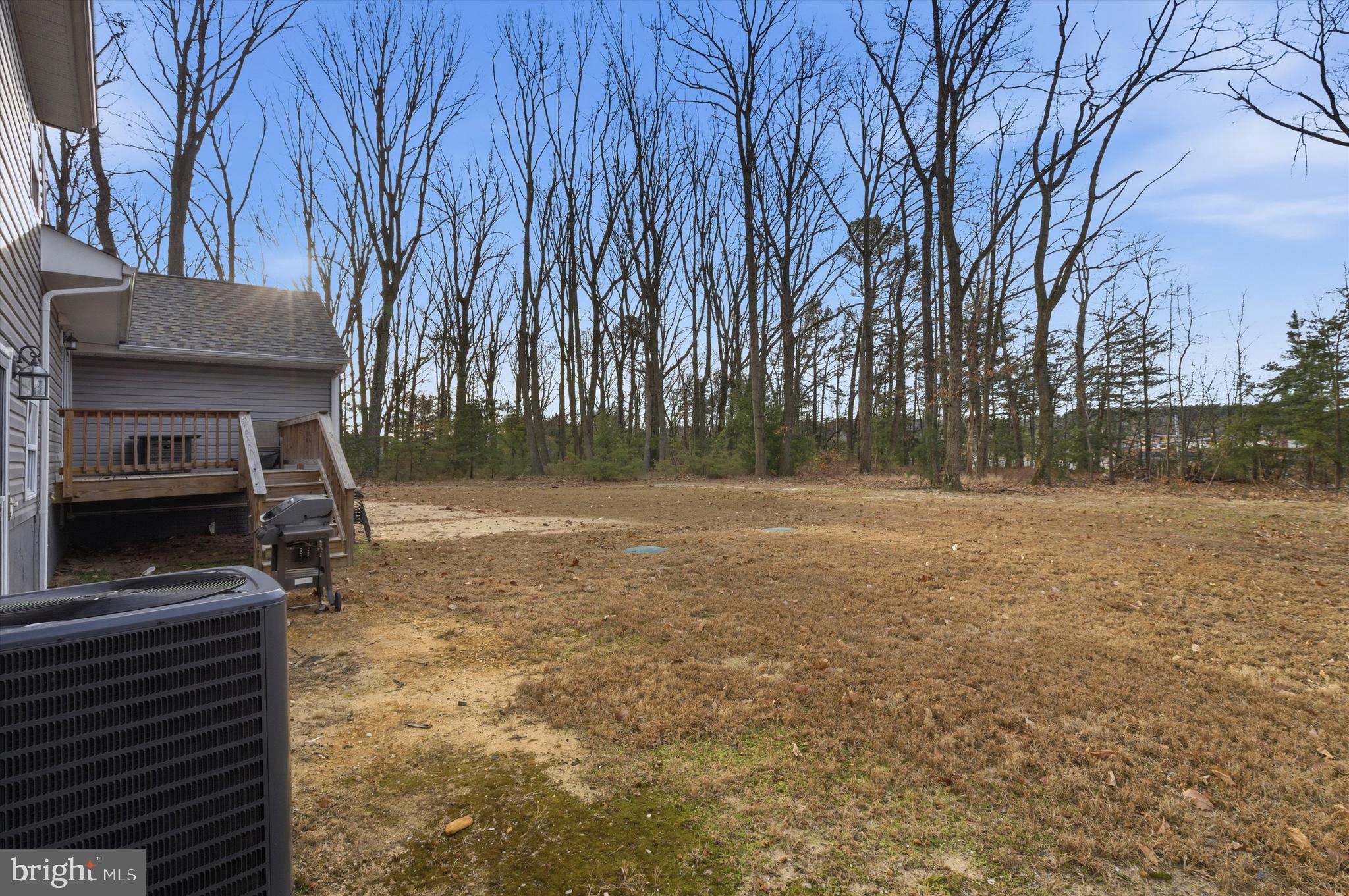 7428 Hawkins Drive Hanover, MD 21076 - Photo 37 of 44 a backyard of a house with lots of green space