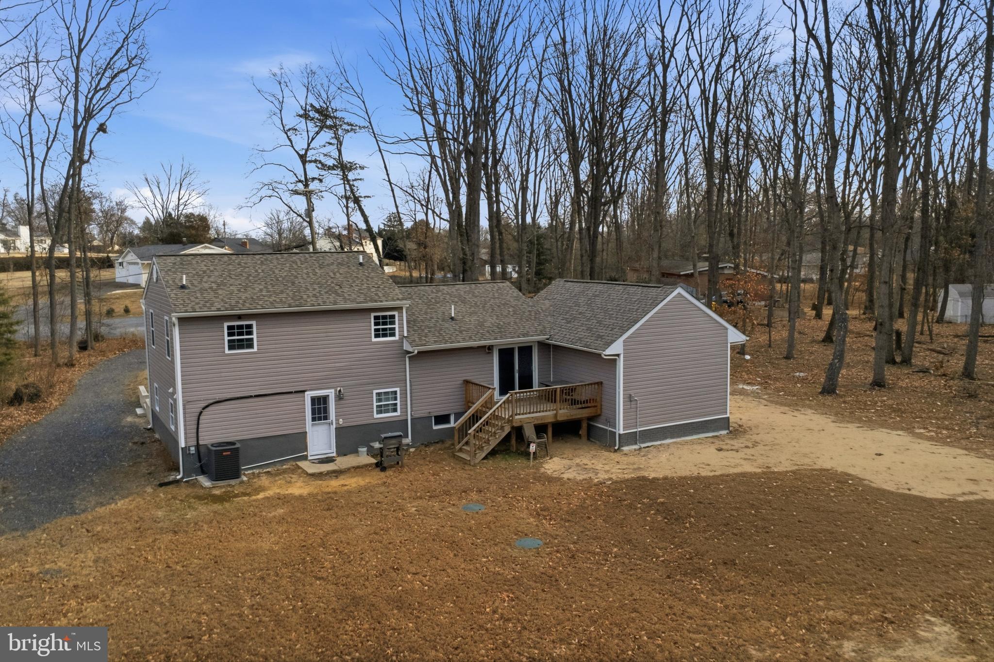 7428 Hawkins Drive Hanover, MD 21076 - Photo 39 of 44 a view of a house with backyard and a tree