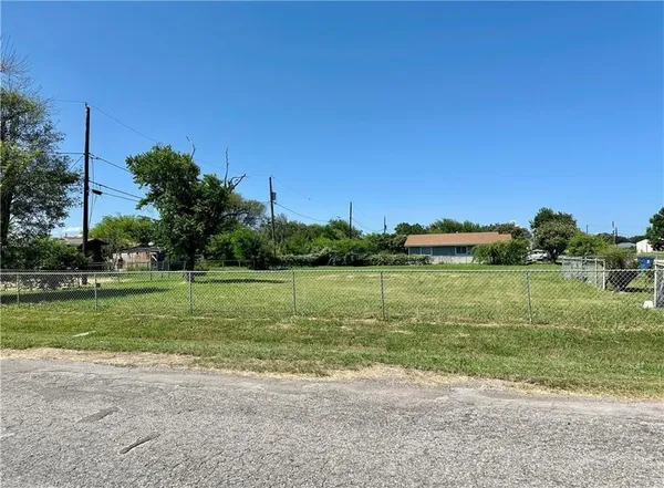 a view of a lake with a big yard