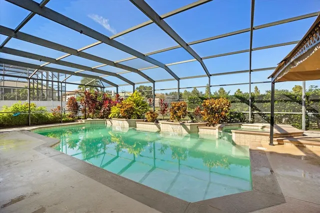 a huge green field with lots of trees