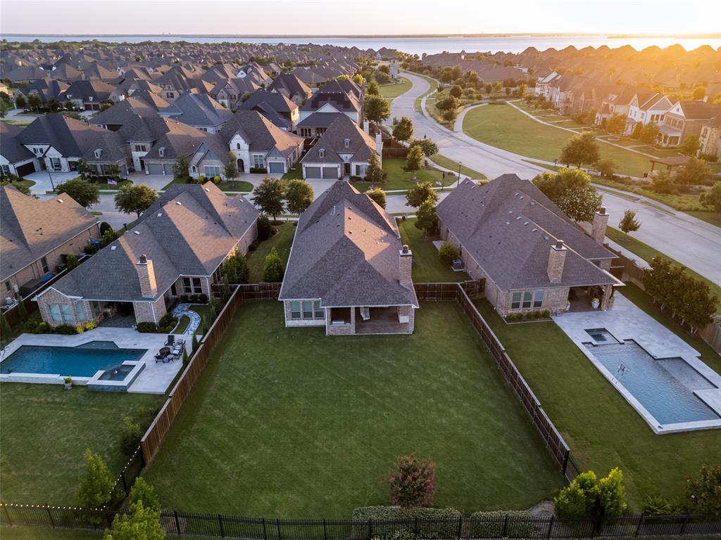 7821 Kentmere The Colony, TX 75056 - Photo 25 of 40 An expansive oversized backyard offers endless possibilities to create the outdoor retreat of your dreams. Whether you envision a resort style pool, outdoor kitchen, sports court, lush gardens, or an incredible entertaining space, this generous homesite provides the perfect canvas to design your own private backyard oasis while enjoying peaceful waterfront surroundings.