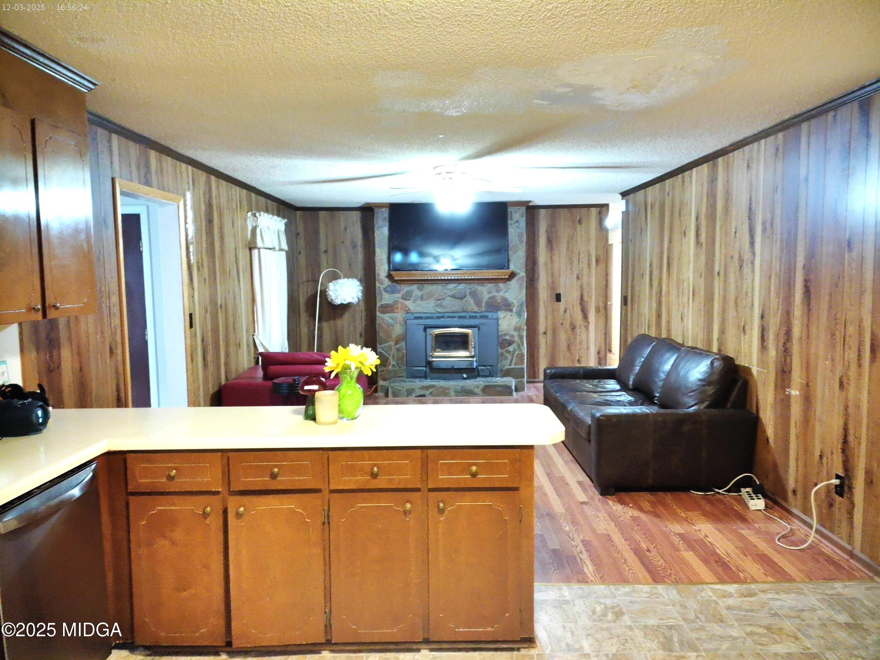 3850 Hitchcock Road Macon, GA 31217 - Photo 11 of 14 a living room with furniture and a fireplace