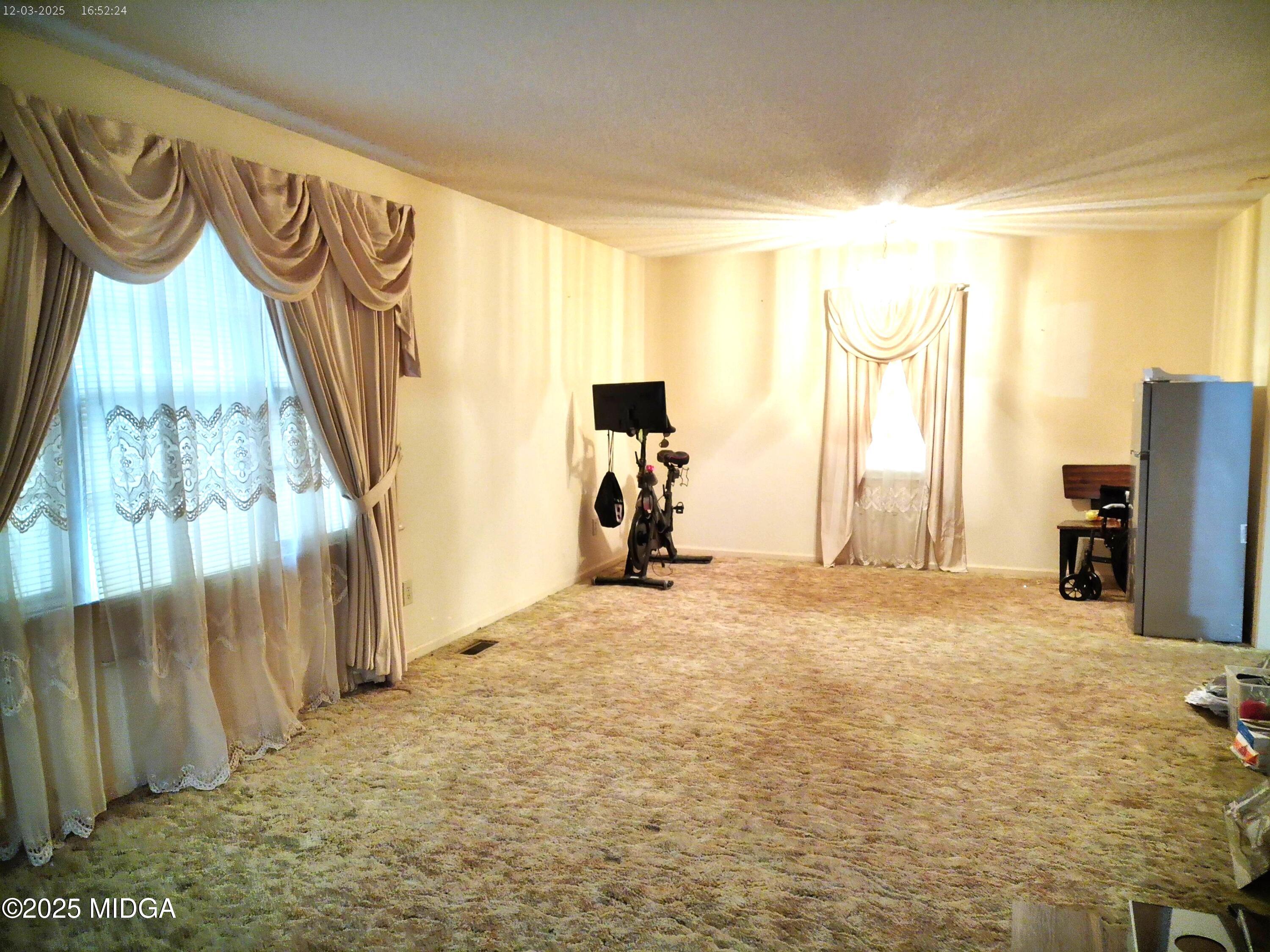 3850 Hitchcock Road Macon, GA 31217 - Photo 2 of 14 a view of a room with wooden floor and a window