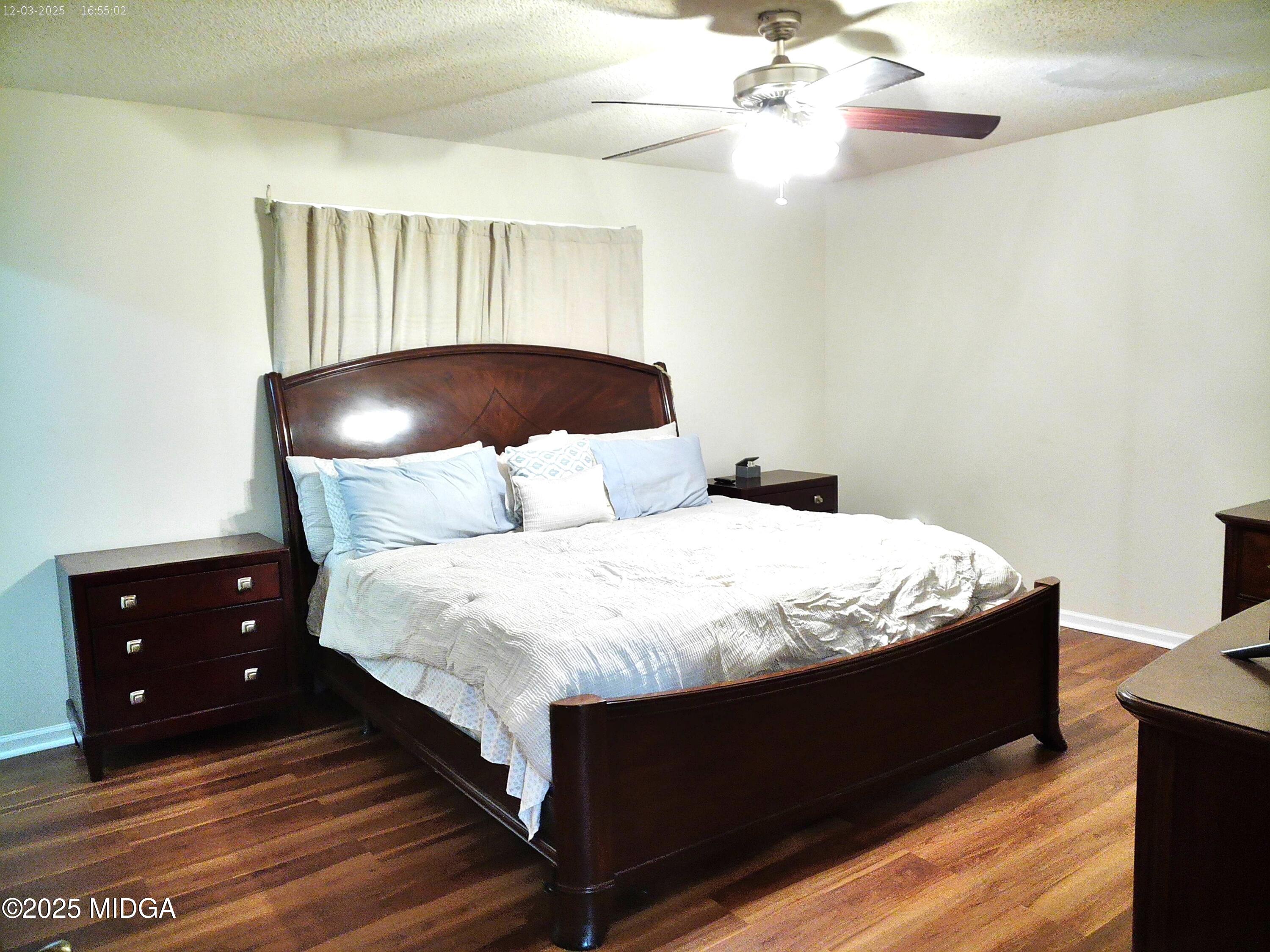3850 Hitchcock Road Macon, GA 31217 - Photo 6 of 14 a bedroom with a bed and a dresser