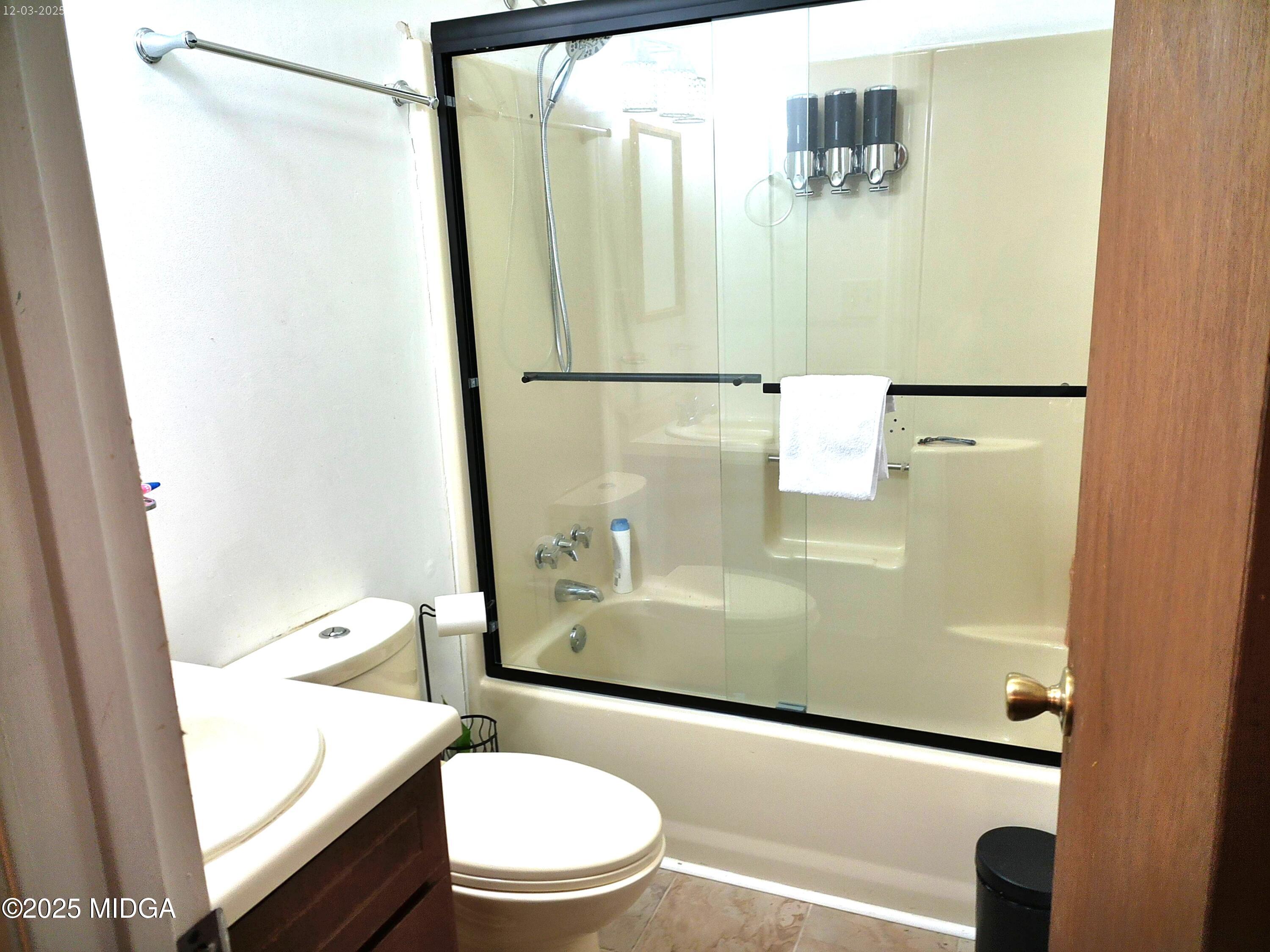 3850 Hitchcock Road Macon, GA 31217 - Photo 8 of 14 a bathroom with a shower toilet and sink