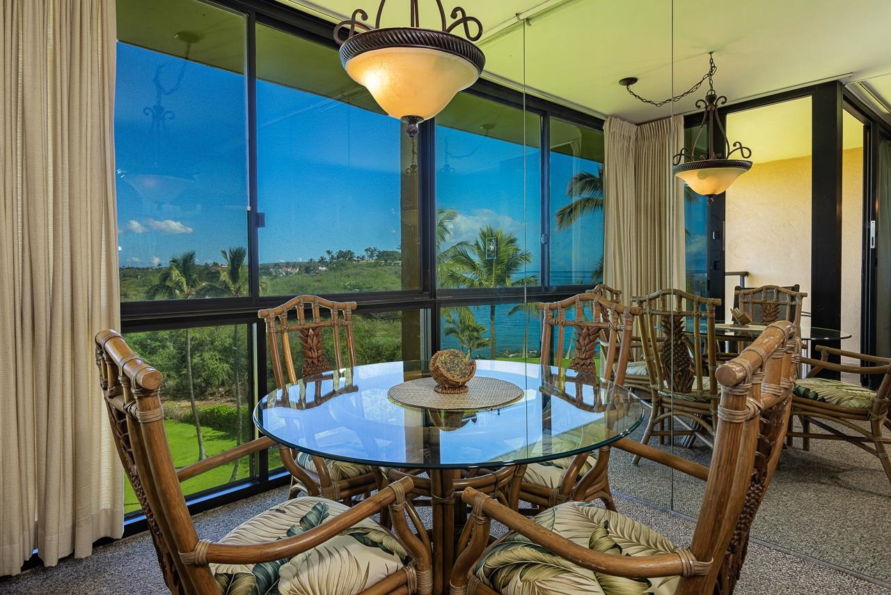 2936 South Kihei Road, Unit 613 Kihei, HI 96753 - Photo 5 of 46 a view of a dining room with furniture window and outside view