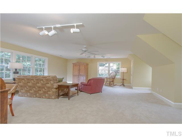 405 Mumm Lane Raleigh, NC 27615 - Photo 15 of 25 a living room with furniture and window