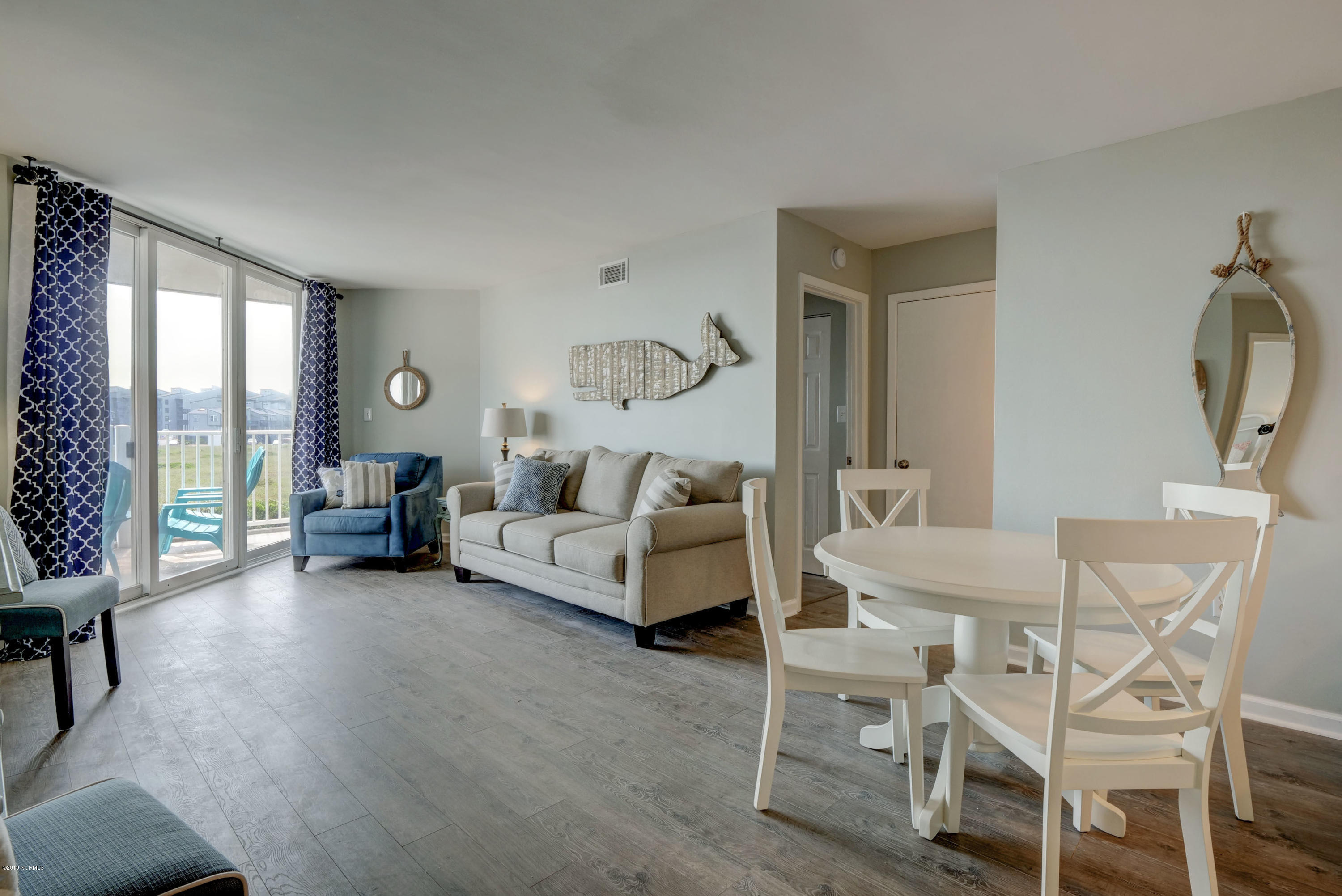 2000 New River Inlet Road, Unit 1103 North Topsail Beach, NC 28460 - Photo 11 of 39 Living Room/Breakfast Table