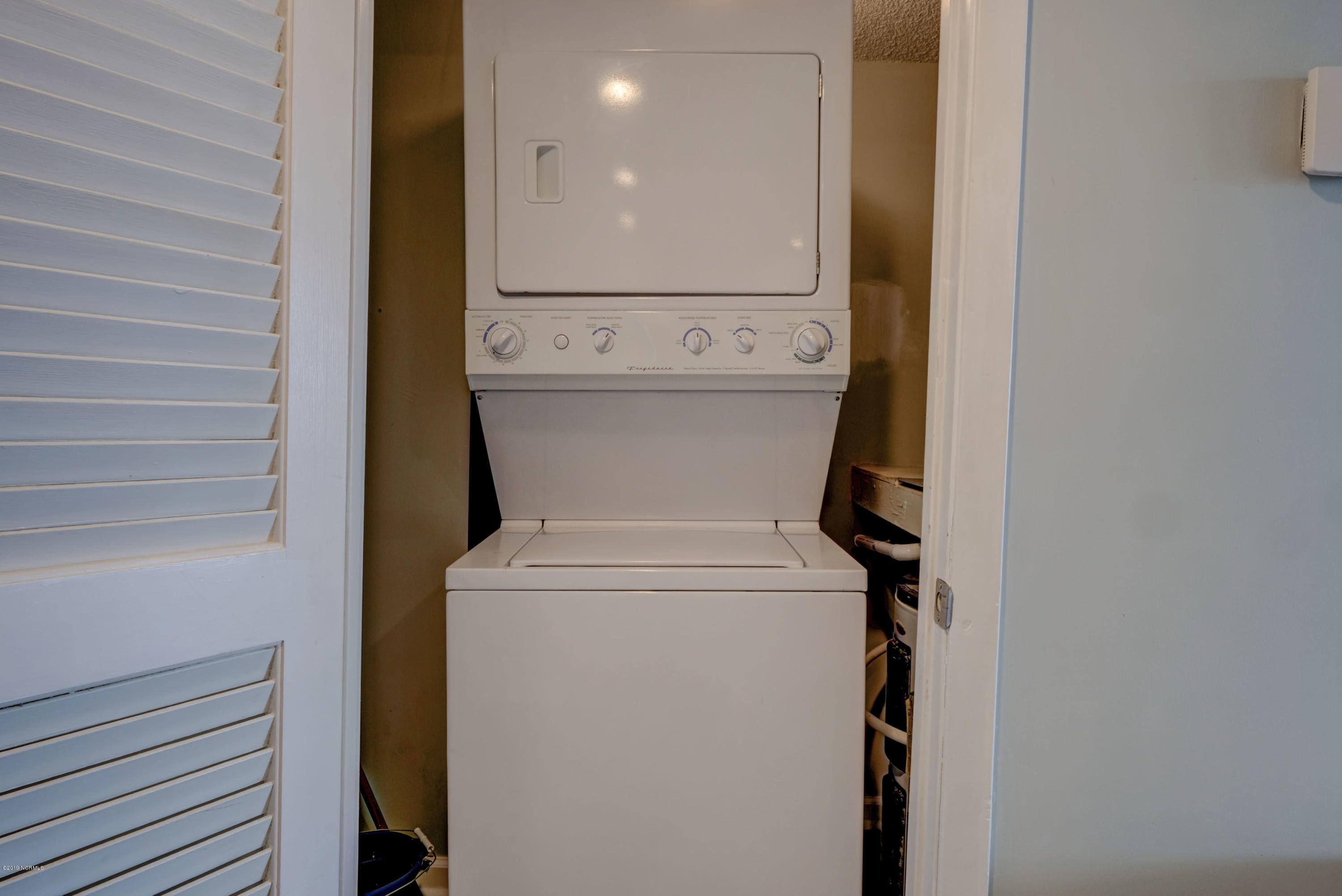 2000 New River Inlet Road, Unit 1103 North Topsail Beach, NC 28460 - Photo 25 of 39 Laundry Closet