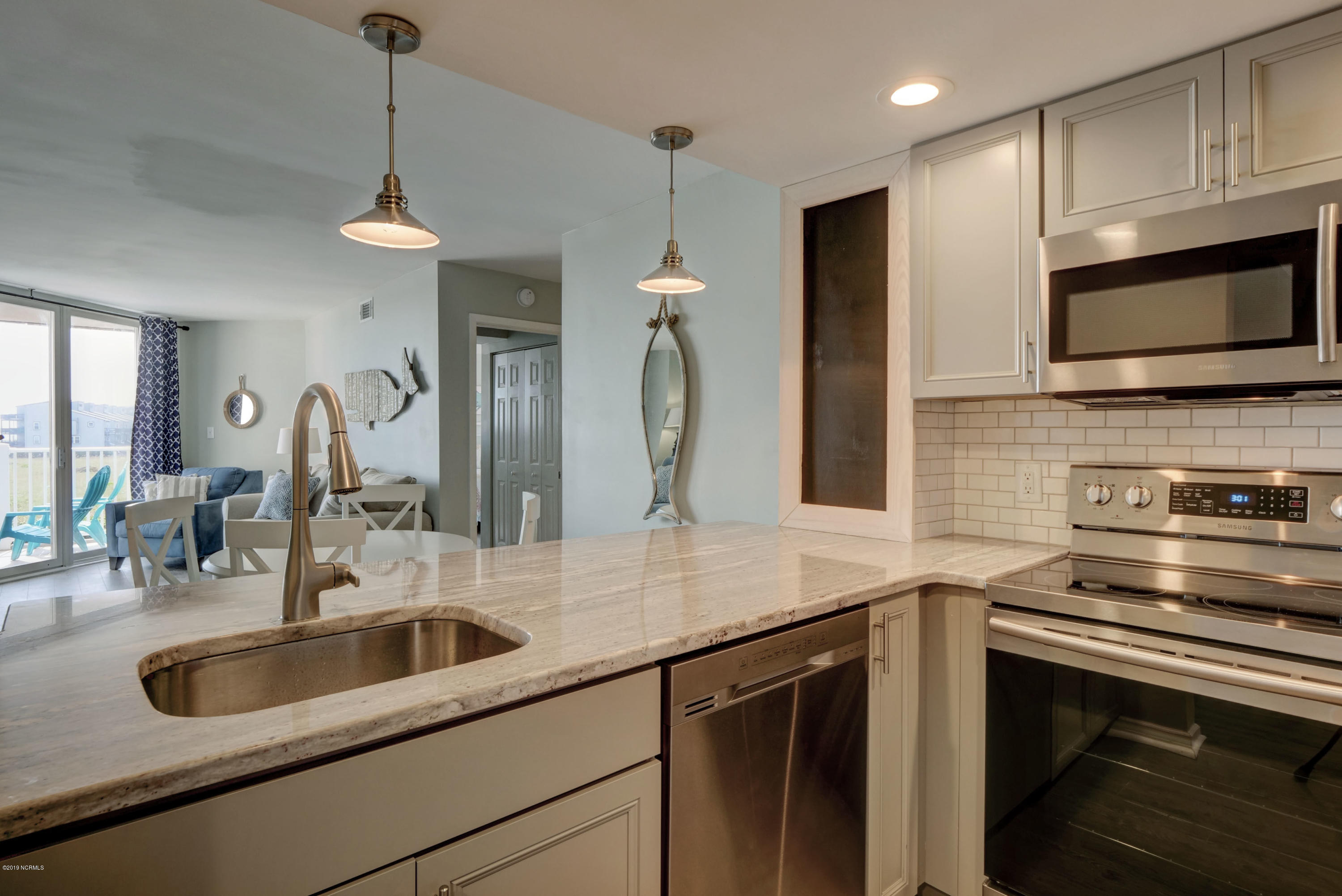 2000 New River Inlet Road, Unit 1103 North Topsail Beach, NC 28460 - Photo 4 of 39 Kitchen/Breakfast Bar
