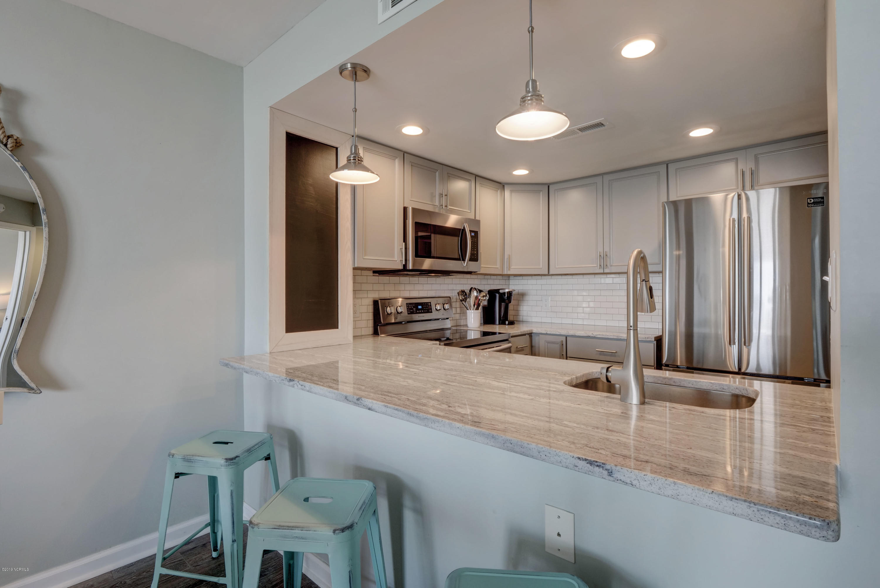 2000 New River Inlet Road, Unit 1103 North Topsail Beach, NC 28460 - Photo 6 of 39 Kitchen/Breakfast Bar