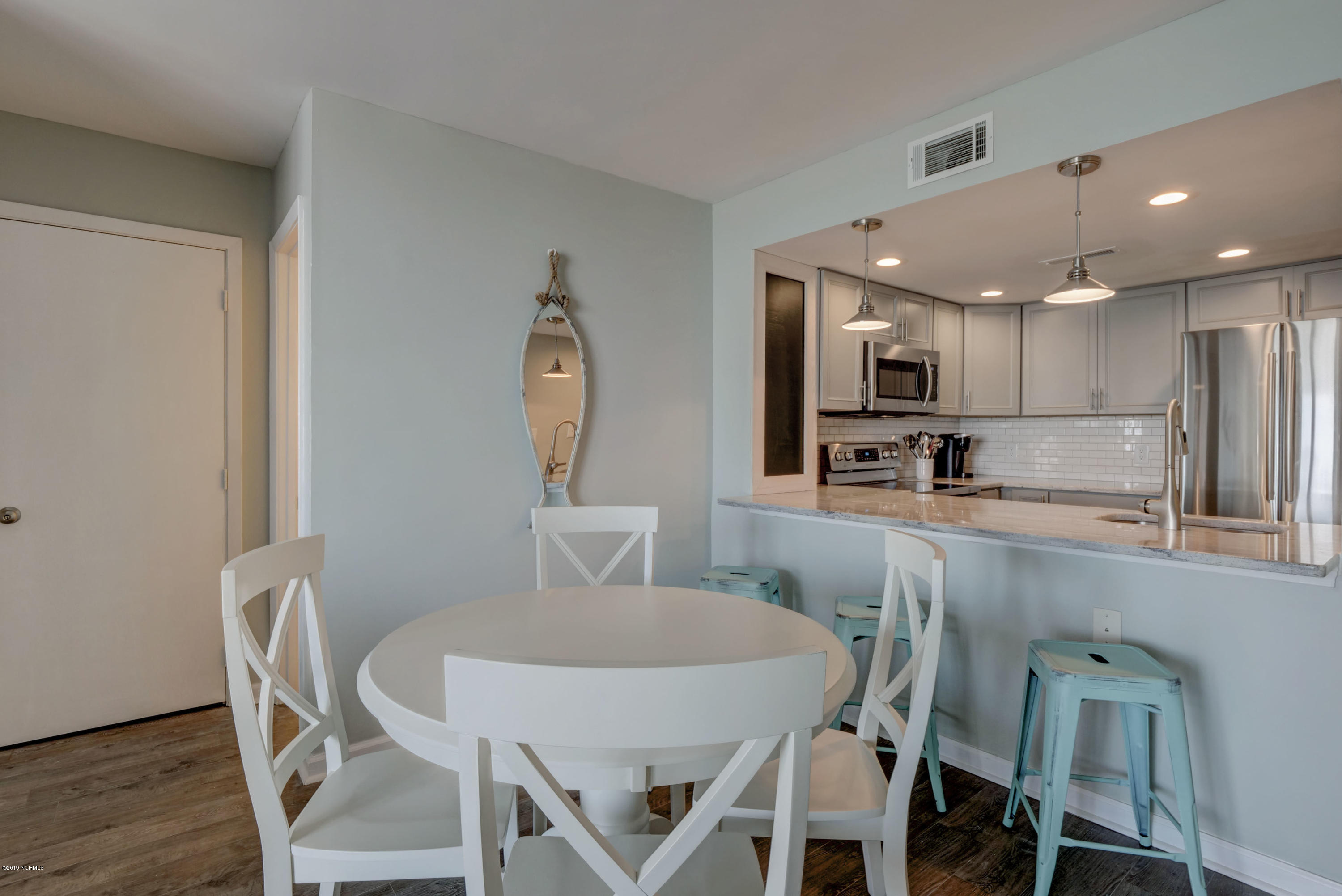 2000 New River Inlet Road, Unit 1103 North Topsail Beach, NC 28460 - Photo 7 of 39 Kitchen/Breakfast Bar/Breakfast Table