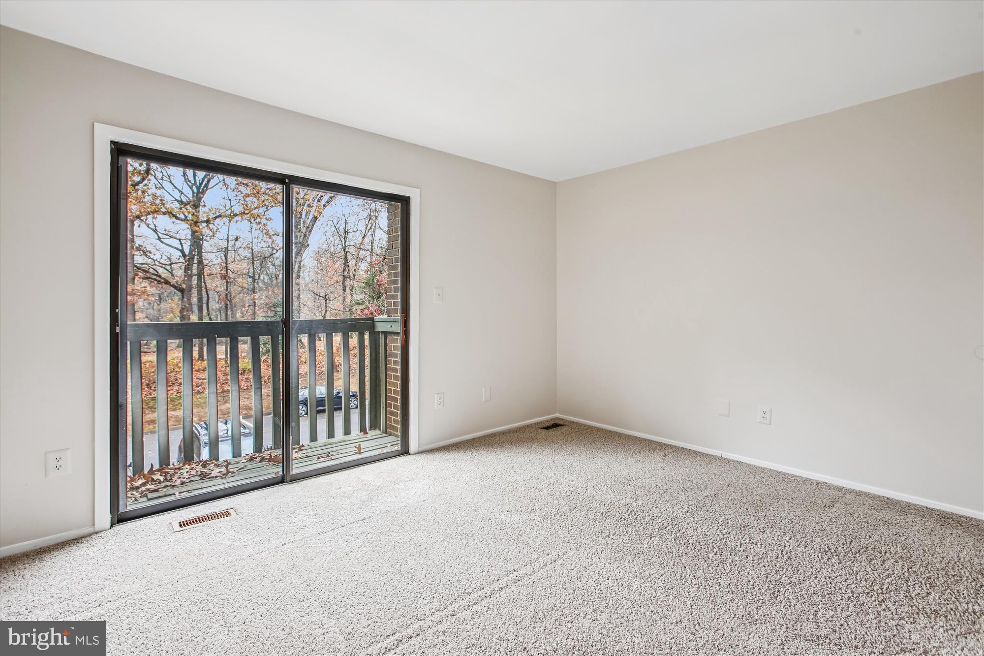 2025 Winged Foot Court Reston, VA 20191 - Photo 23 of 59 a view of an empty room with a window