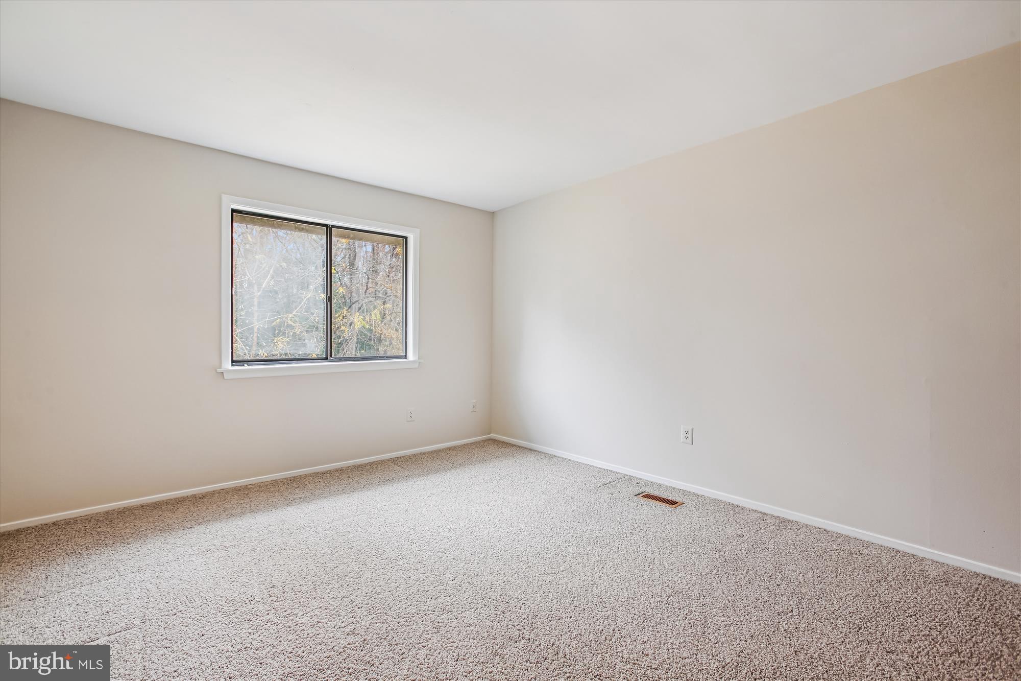 2025 Winged Foot Court Reston, VA 20191 - Photo 28 of 59 an empty room with a window