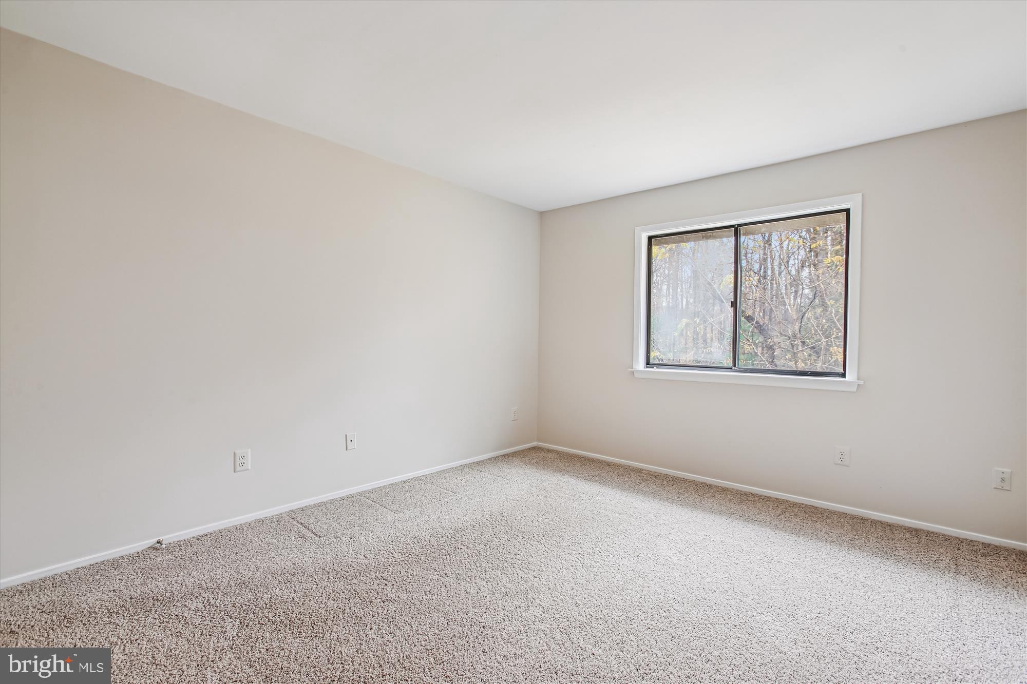 2025 Winged Foot Court Reston, VA 20191 - Photo 29 of 59 an empty room with a window
