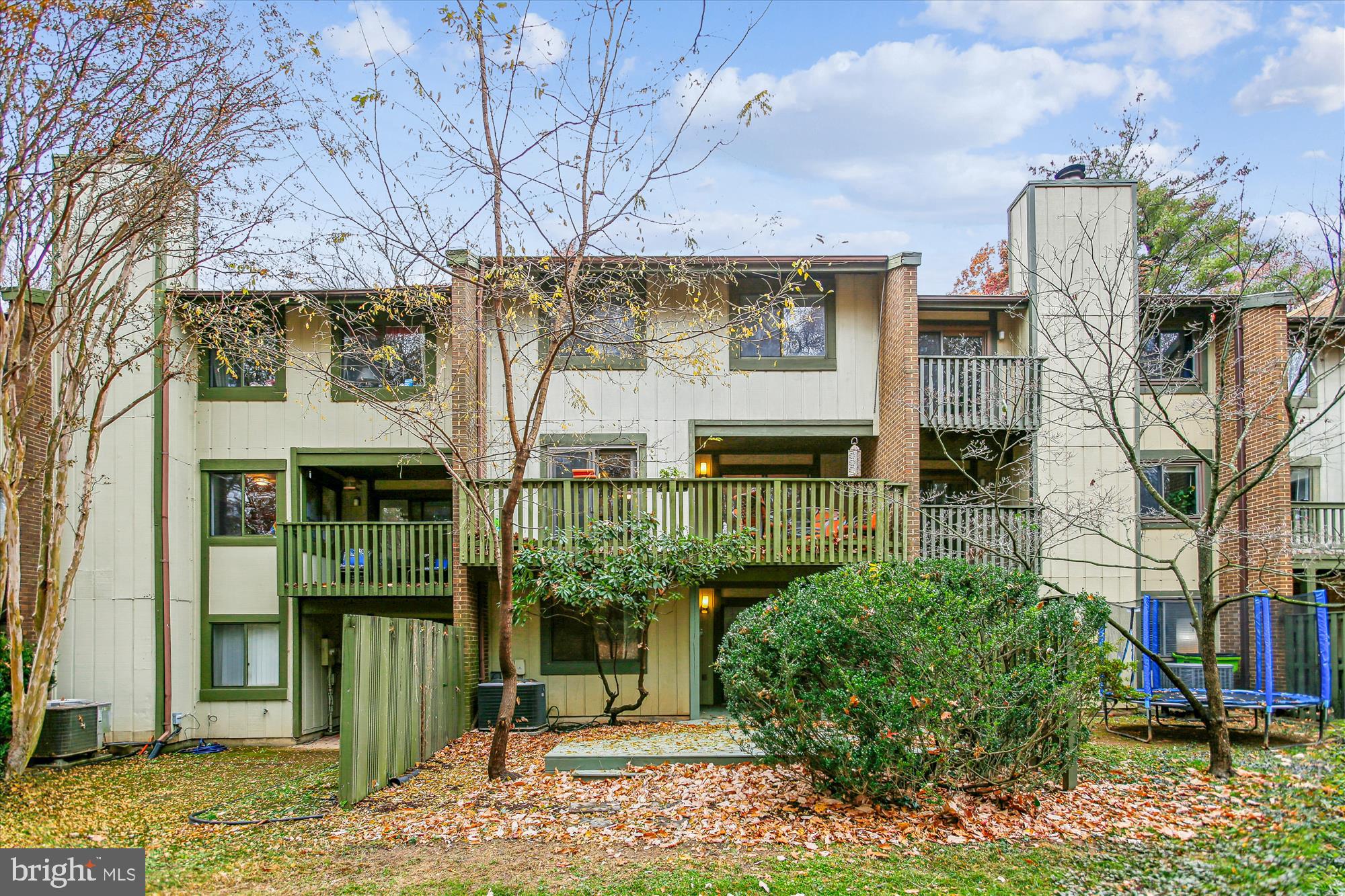 2025 Winged Foot Court Reston, VA 20191 - Photo 45 of 59 a front view of a house with a yard