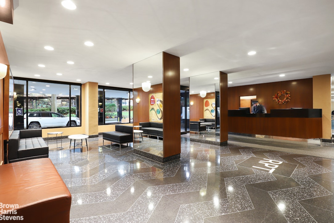 555 Kappock Street, Unit 2E Bronx, NY 10463 - Photo 16 of 39 a lobby with furniture and outdoor view