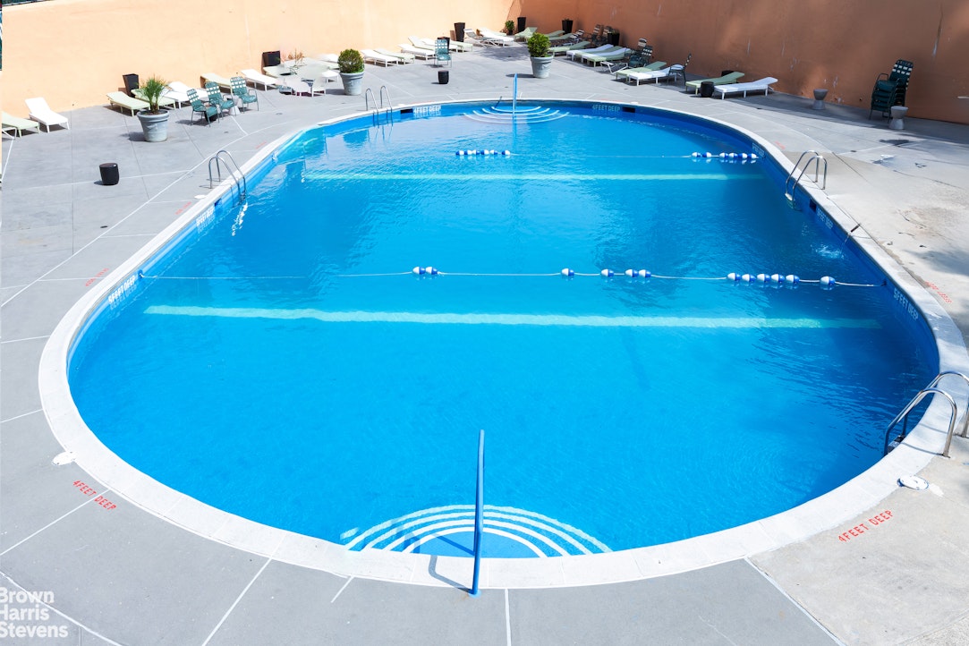 555 Kappock Street, Unit 2E Bronx, NY 10463 - Photo 18 of 39 a view of a swimming pool with a chair