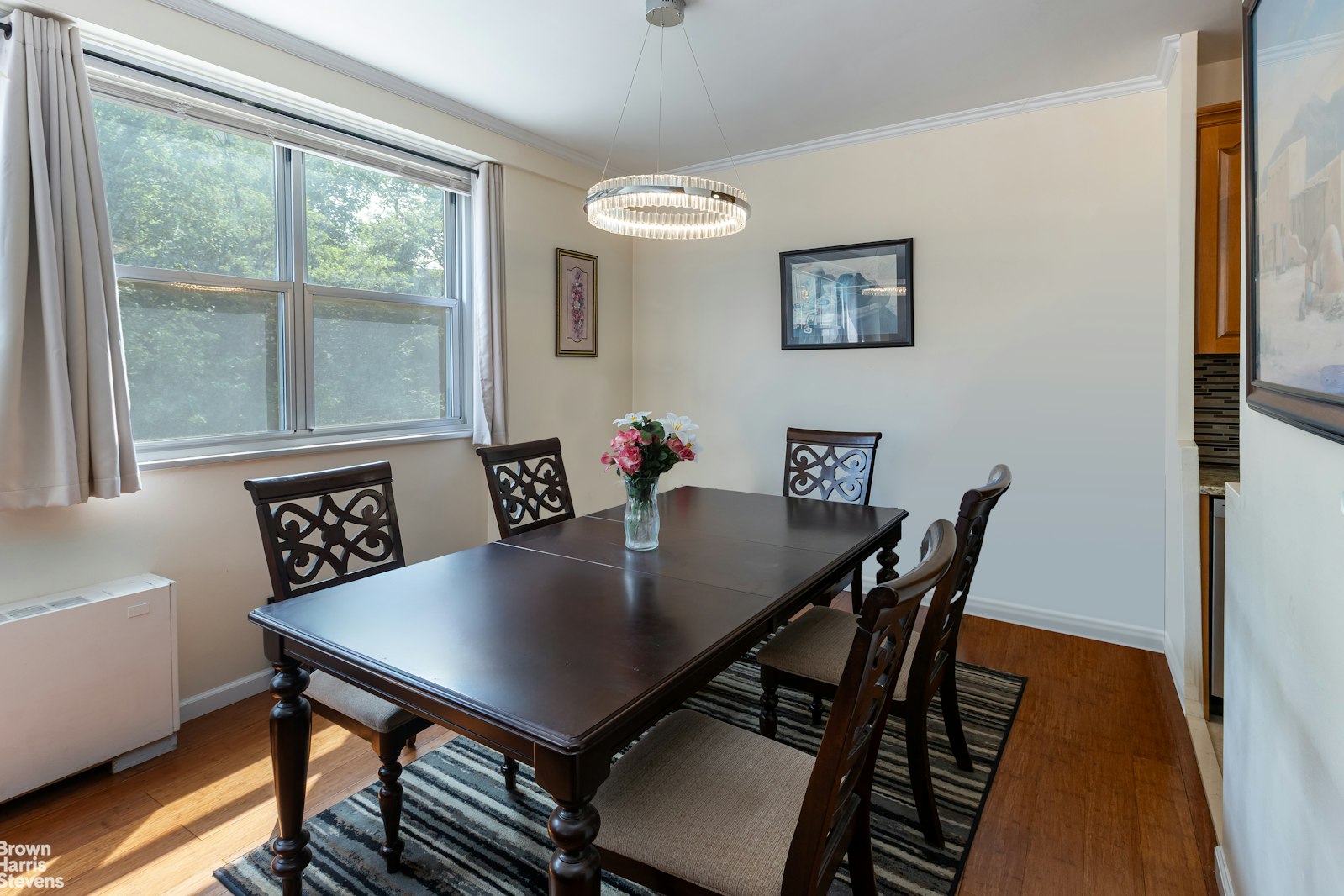 555 Kappock Street, Unit 2E Bronx, NY 10463 - Photo 26 of 39 a view of a dining room with furniture and wooden floor