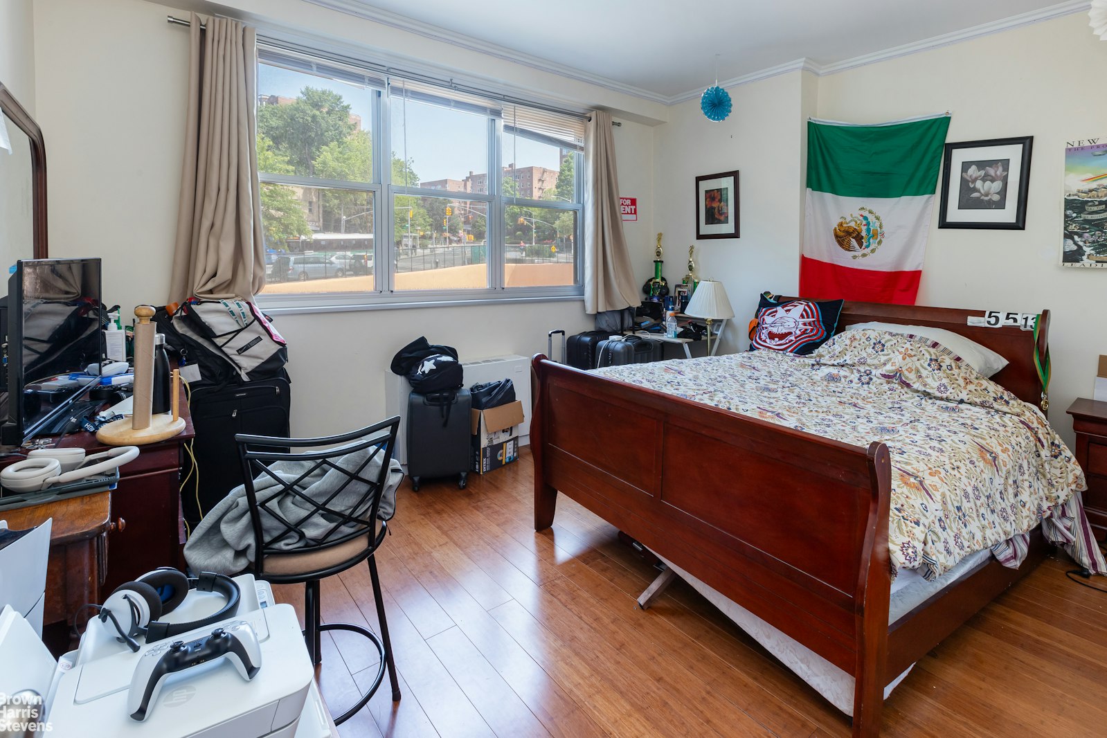 555 Kappock Street, Unit 2E Bronx, NY 10463 - Photo 29 of 39 a bed room with a bed and a chair