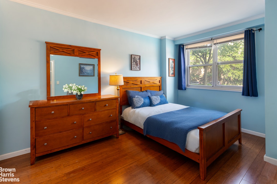 555 Kappock Street, Unit 2E Bronx, NY 10463 - Photo 9 of 39 a bedroom with a bed and window