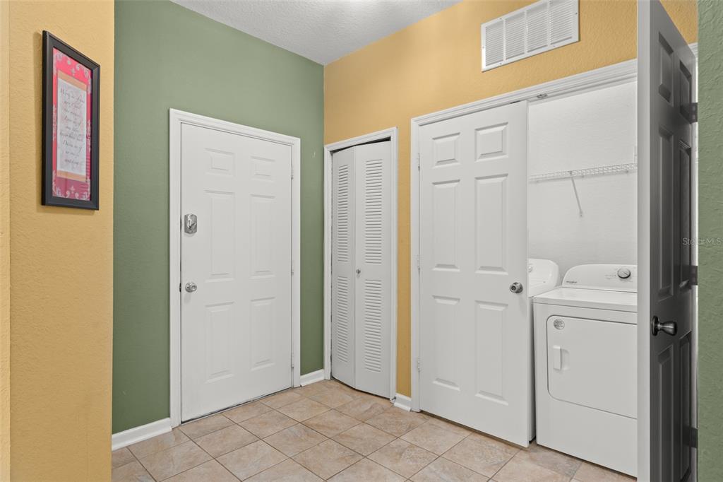 7675 Comrow Street, Unit 405 Kissimmee, FL 34747 - Photo 4 of 40 a view of a hallway with closet area