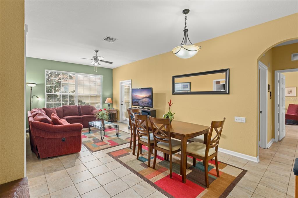 7675 Comrow Street, Unit 405 Kissimmee, FL 34747 - Photo 8 of 40 a view of a livingroom with furniture and window