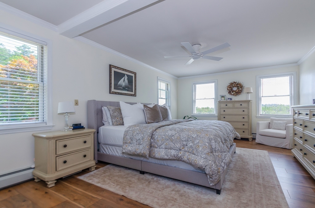 1-3 Doctor Hickey Lane Rochester, MA 02770 - Photo 15 of 38 a spacious bedroom with a bed and a window