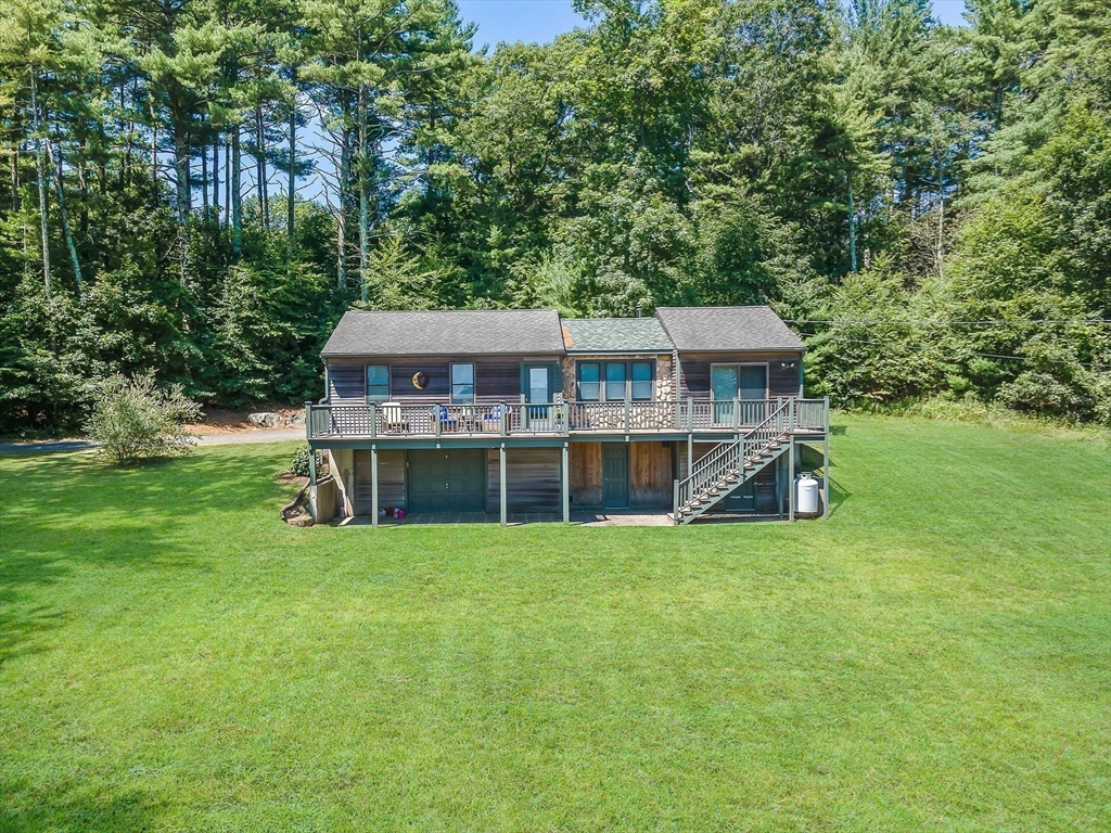 1-3 Doctor Hickey Lane Rochester, MA 02770 - Photo 25 of 38 a view of a house with a yard and sitting area