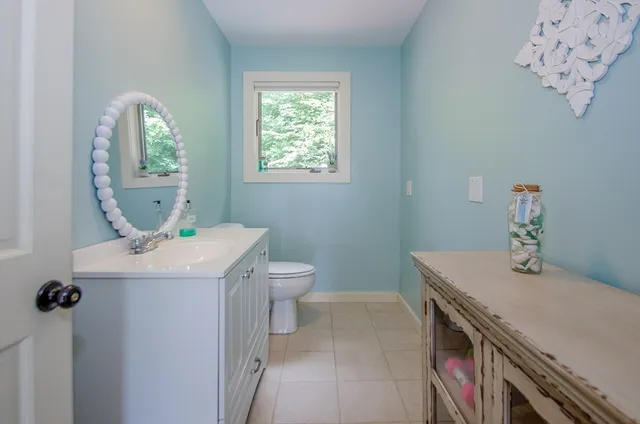 a bathroom with a sink and toilet