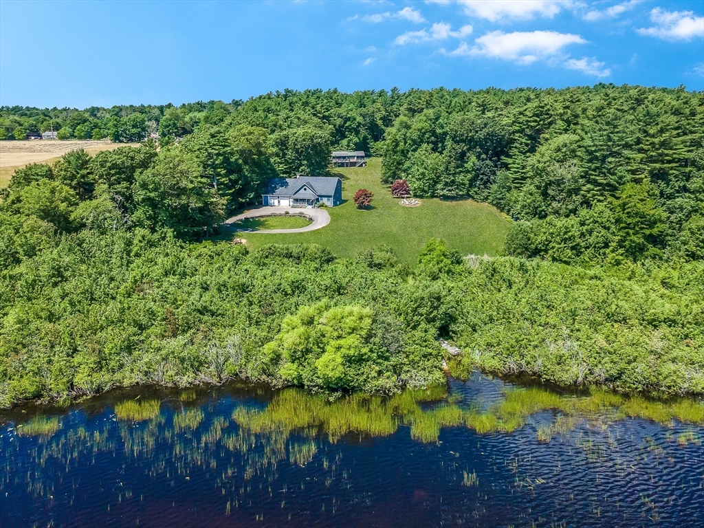 1-3 Doctor Hickey Lane Rochester, MA 02770 - Photo 3 of 38 a aerial view of a house with a yard and lake view