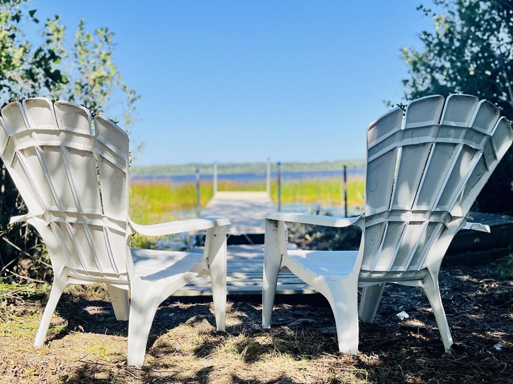 1-3 Doctor Hickey Lane Rochester, MA 02770 - Photo 4 of 38 a view of a chairs and table in the patio