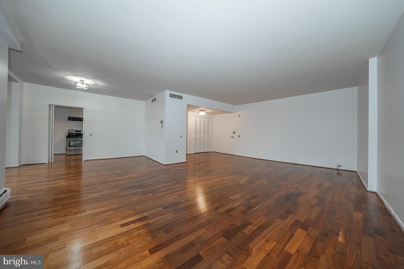 191 Presidential Boulevard, Unit R402 Bala Cynwyd, PA 19004 - Photo 12 of 27 a view of empty room with wooden floor