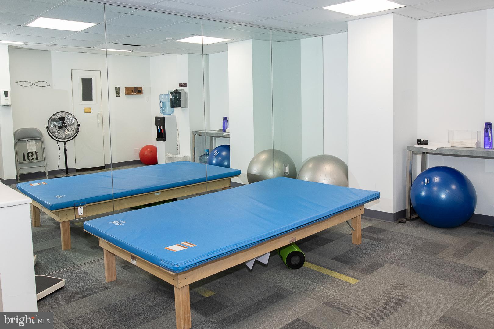 191 Presidential Boulevard, Unit R402 Bala Cynwyd, PA 19004 - Photo 23 of 27 a room with pool table and paintings on the wall