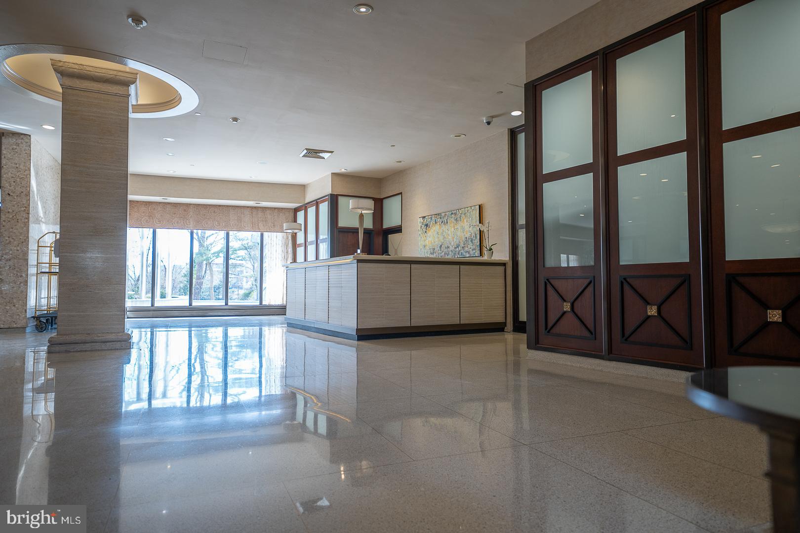 191 Presidential Boulevard, Unit R402 Bala Cynwyd, PA 19004 - Photo 6 of 27 a view of a kitchen with furniture and a large window