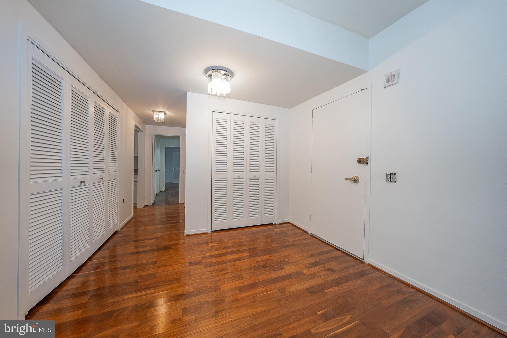 191 Presidential Boulevard, Unit R402 Bala Cynwyd, PA 19004 - Photo 8 of 27 a view of a hallway with wooden floor